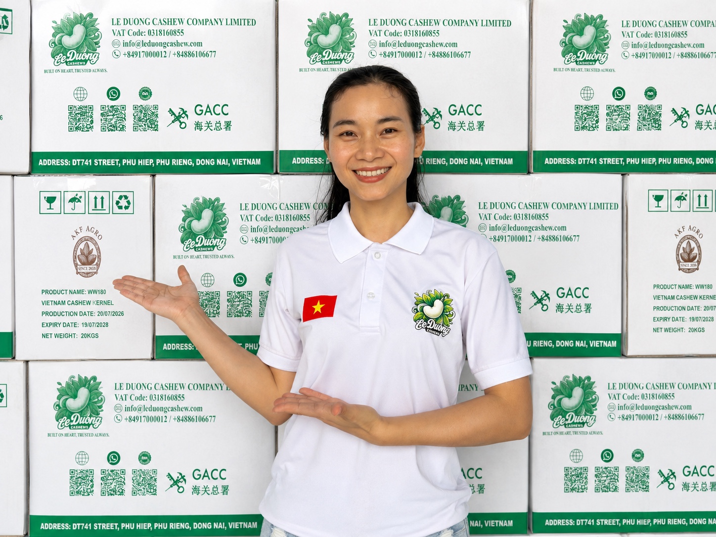 Le Duong Cashew export team presenting WW180 cashew cartons