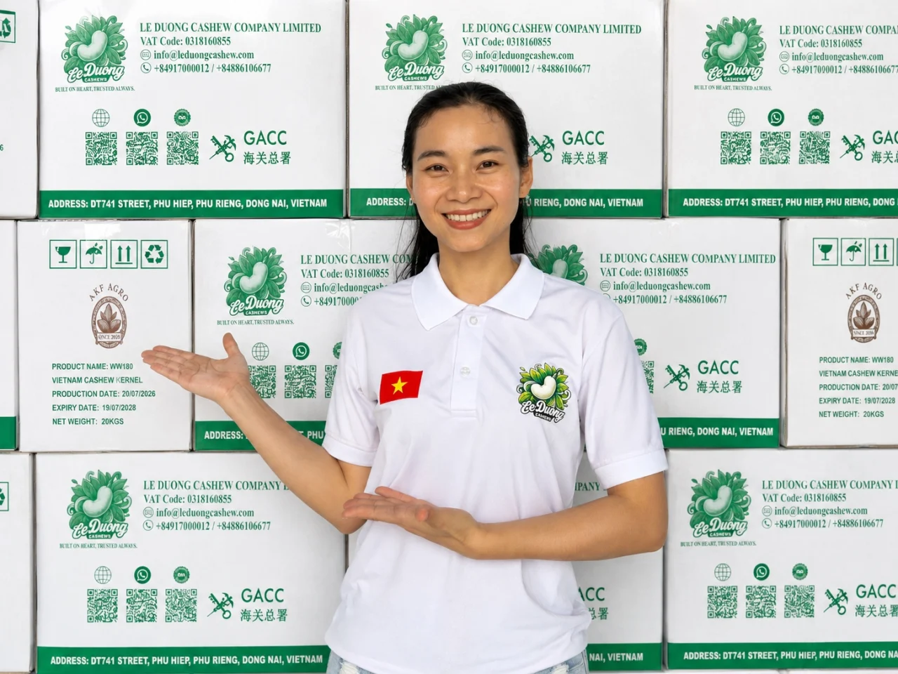 Le Duong Cashew export team presenting WW180 cashew cartons